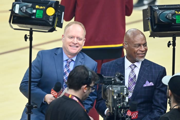 Mar 21, 2022; Cleveland, Ohio, USA; Cleveland Cavaliers television broadcasters John Michael (left) and Austin Carr work prior to a game between the Cleveland Cavaliers and the Los Angeles Lakers at Rocket Mortgage FieldHouse.